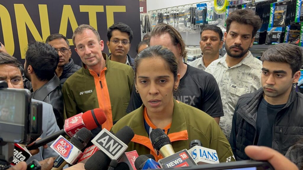 Saina Nehwal and Peter Gade distributed rackets at World Street by Omaxe, along with Yonex, to children in need.